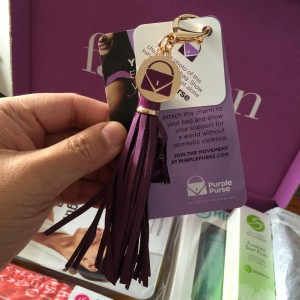 purple purse charm to fight domestic abuse