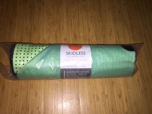 rolled up yoga towel